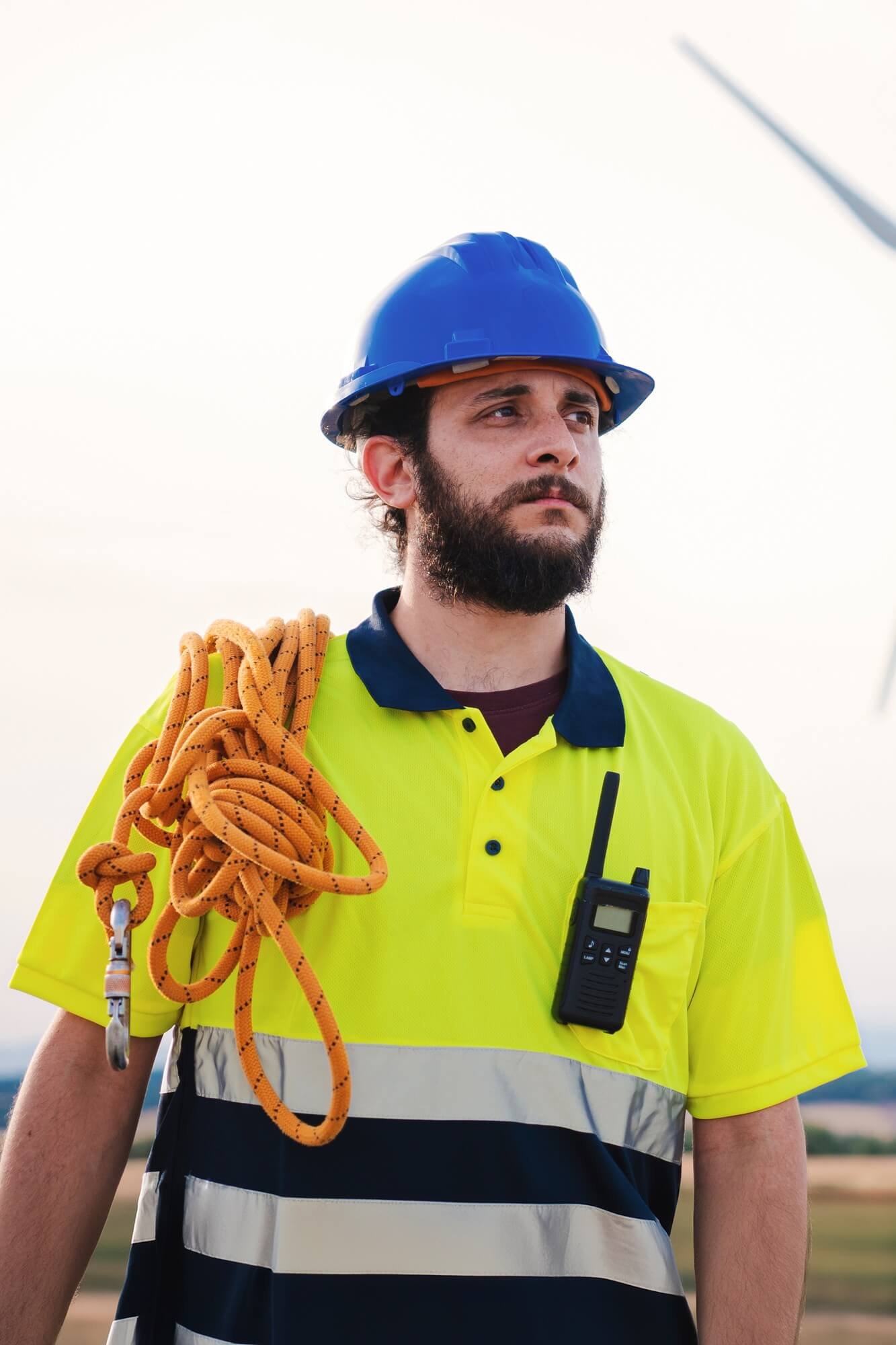 vertical-bearded-technician-engineer-of-windmill-and-renewable-energy-industry-working-and-looking.jpg